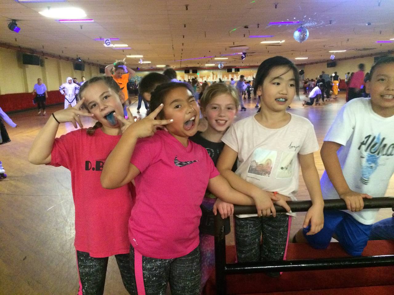 Claire and the crew having fun at the roller rink